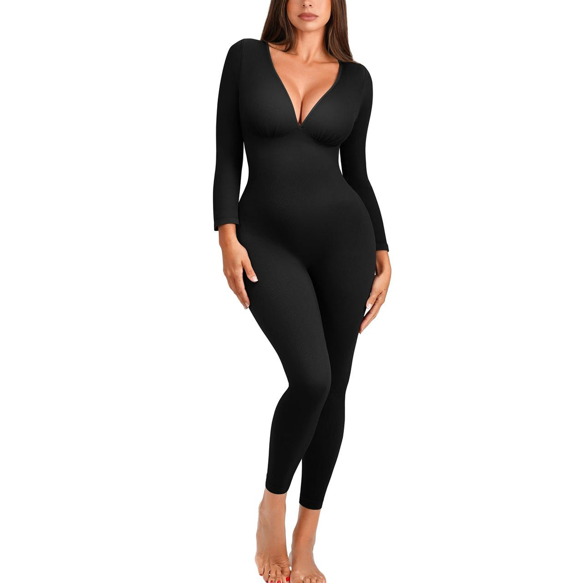 Black ribbed jumpsuit, hand on hip