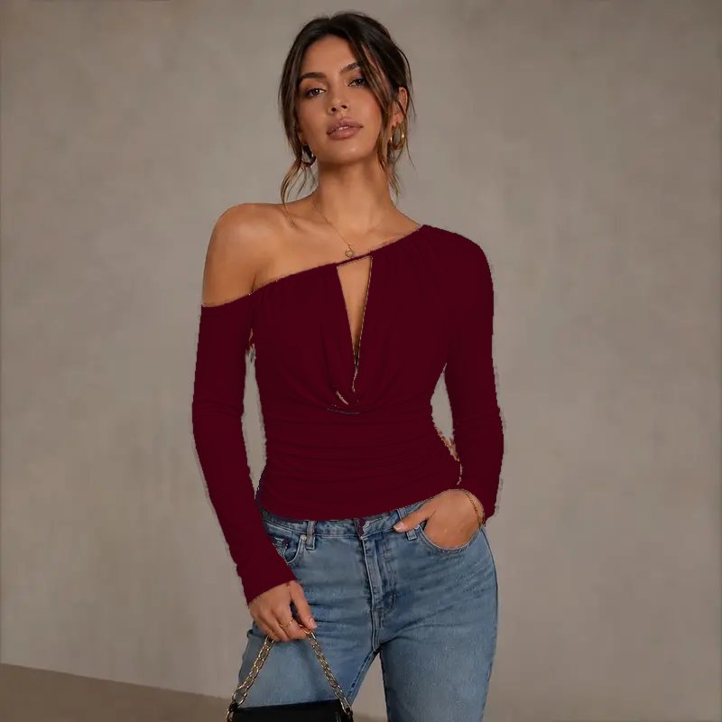 Burgundy — one-shoulder ruched long-sleeve top, front view on model — retouched studio visualisation