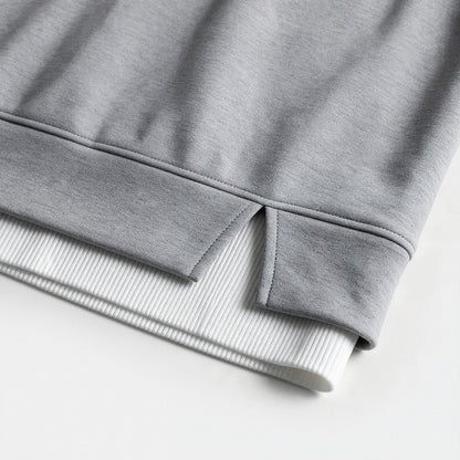 Close-up of the split hem with ribbed under-layer