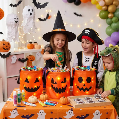 Kids at a Halloween party filling light-up candy buckets with treats